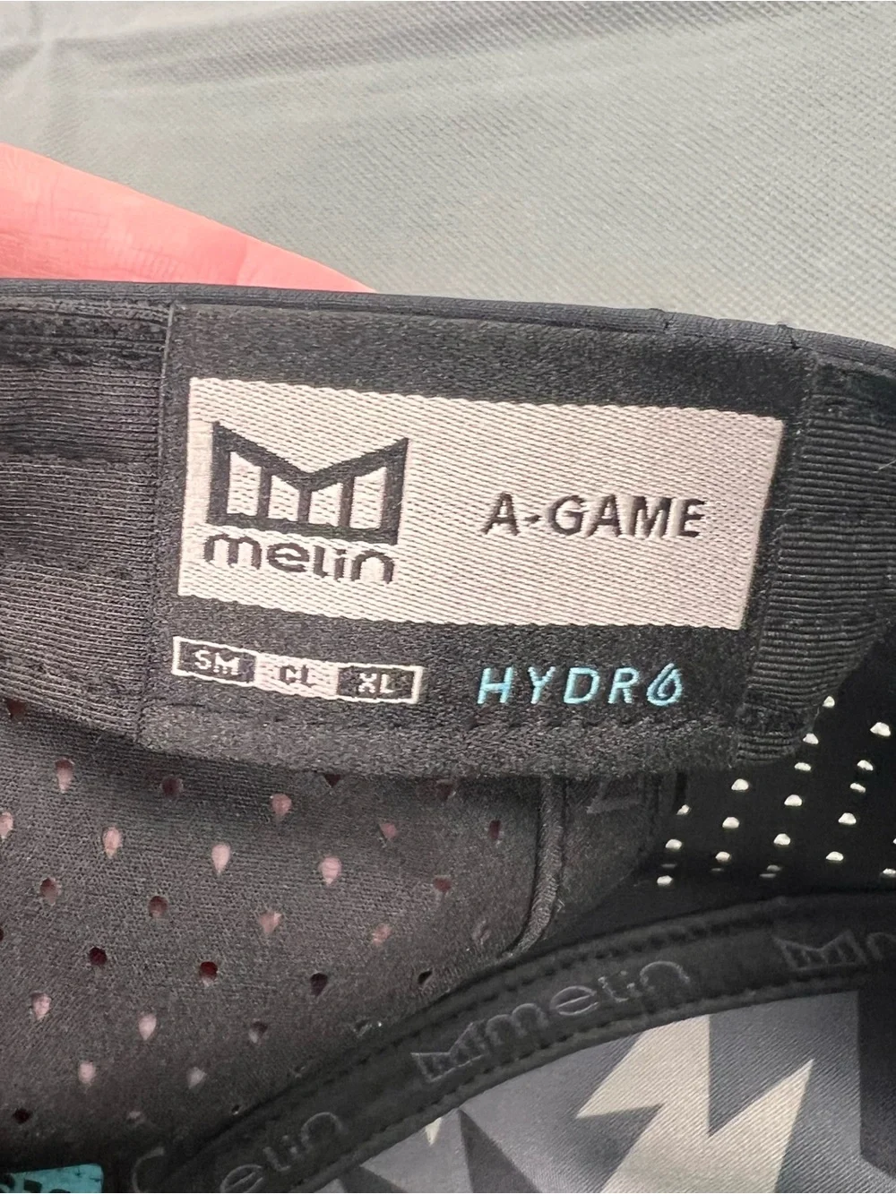Melin x Vessel Golf Hat A-Game Hydro Snapback Cap Black Classic Fit